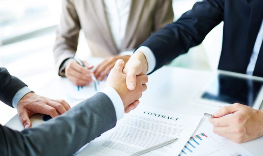 handshake-close-up-executives-min handshake-close-up-executives-min